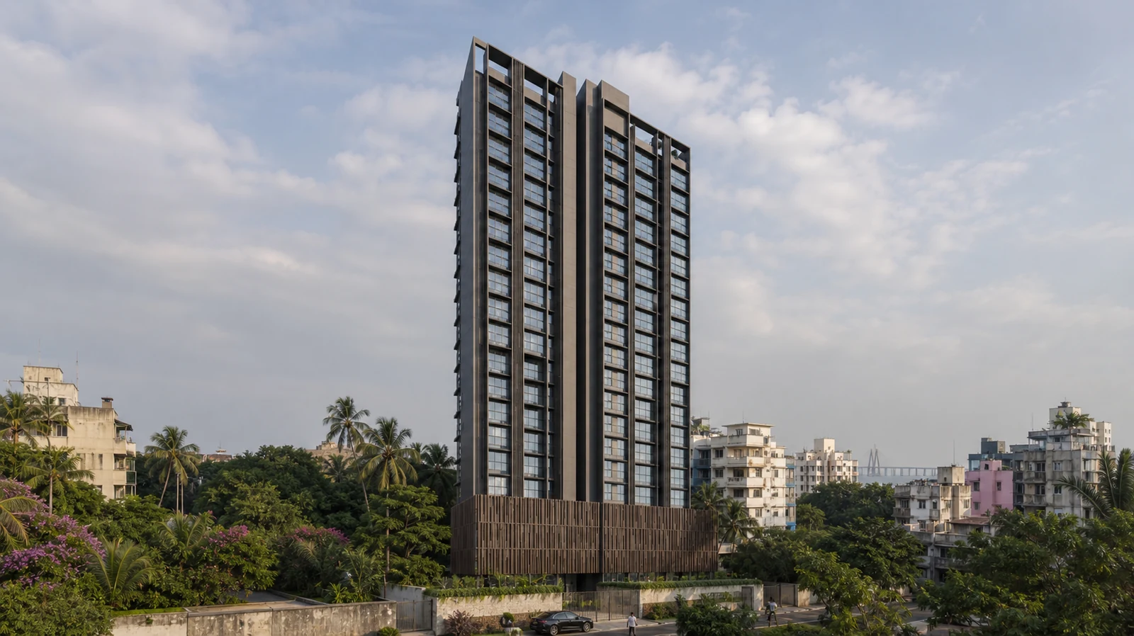 The residential tower rising above landscaped grounds