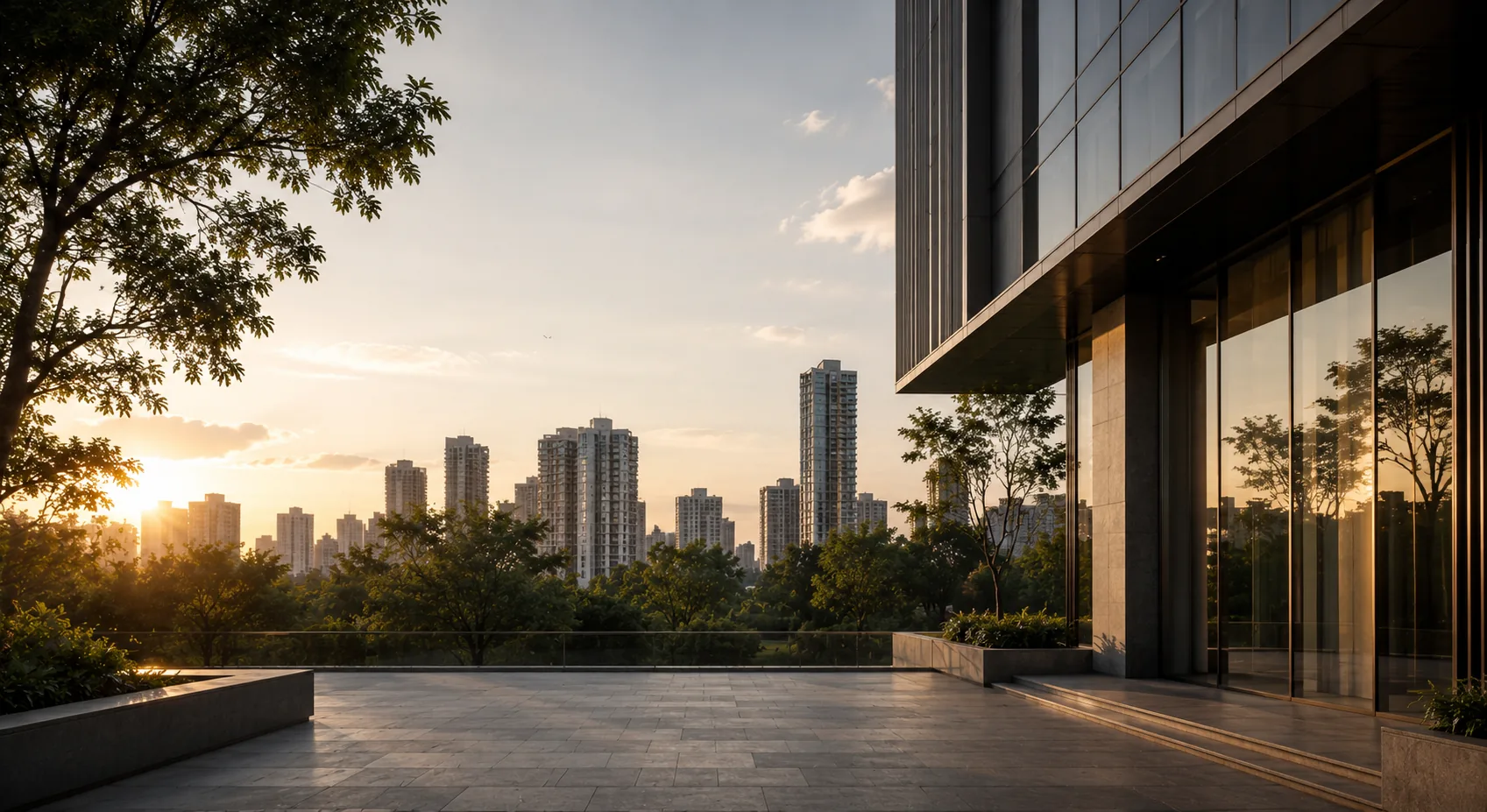 The terrace at sunset, the Bandra skyline beyond the treeline
